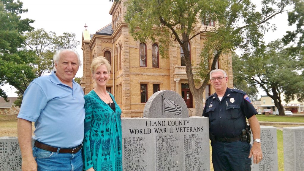 1.Llano County Attorney Becky Lang, retired Colonel, U.S. Army; Llano County Commissioner Ron Wilson, veteran of the U.S. Army JAG Corps; and Llano police officer Kenneth Poe, veteran of the U.S. Army, are pictured alongside the Llano County World War II Veterans Memorial, which includes the name of Wilson’s father, Raymond Wilson.